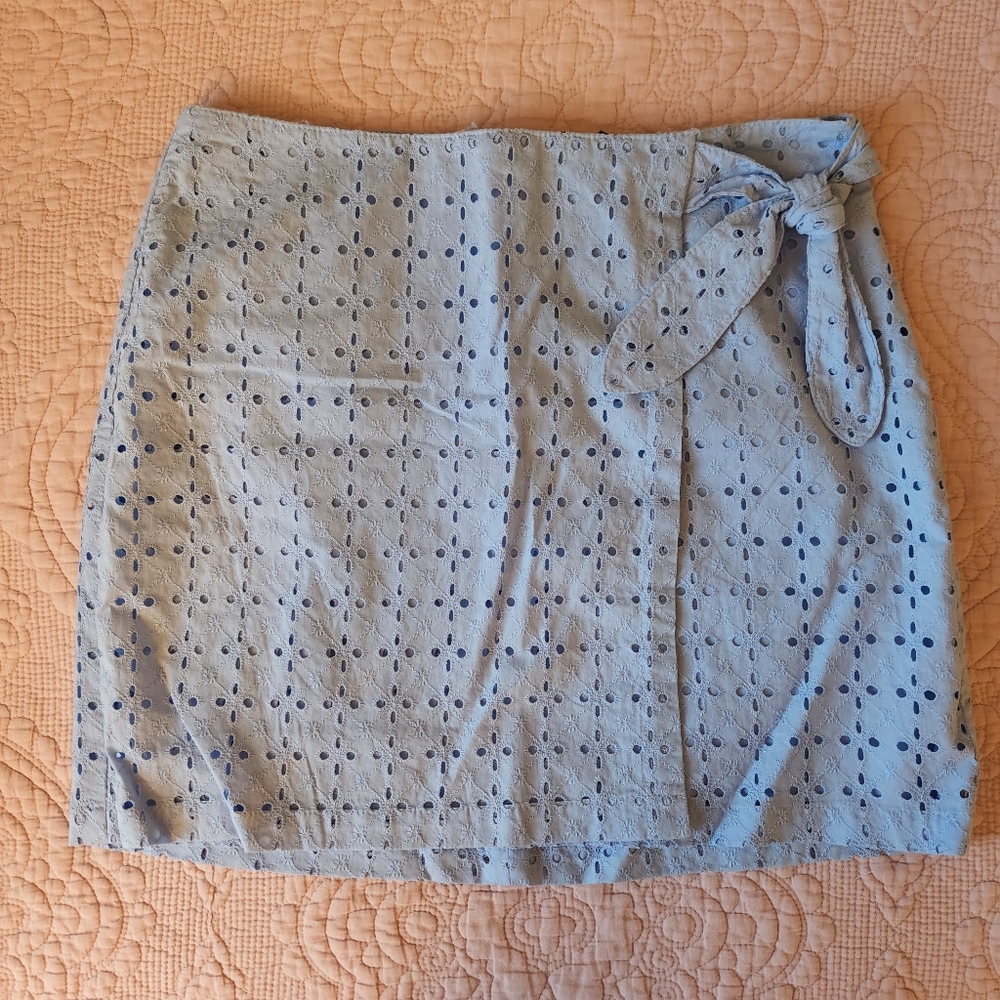 Light blue eyelet knit miniskirt Size 4 NWT